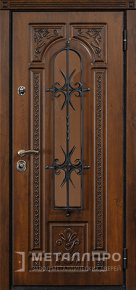 Дверь металлическая «Дверь с ковкой №7» с отделкой  с внешней стороны