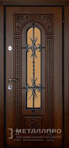 Дверь металлическая «Входная дверь в частный дом с отделкой МДФ ковкой и стеклом» с внешней стороны МДФ ПВХ