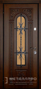 Дверь металлическая «Входная дверь в частный дом с отделкой МДФ ковкой и стеклом» с внутренней стороны МДФ ПВХ