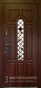 Дверь металлическая «Дверь с ковкой №10» с внешней стороны МДФ ПВХ